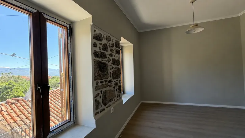 Room with a view over the rooftops